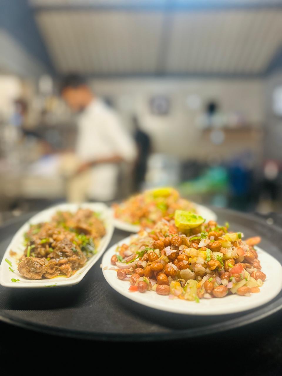 Freshly plated starters at the kitchen serving window