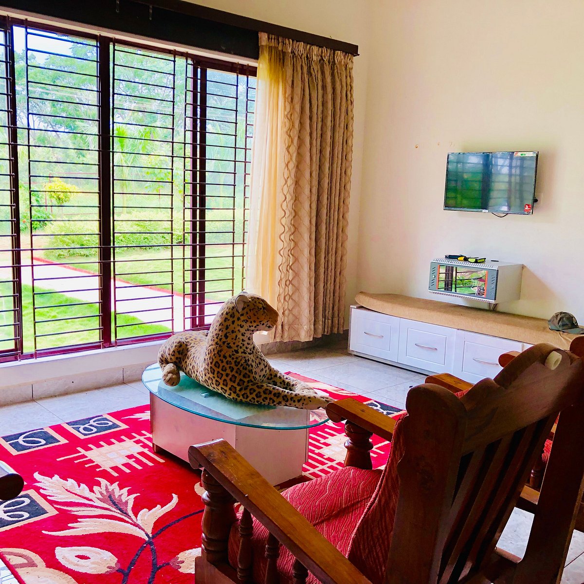 Villa living area with garden views and traditional decor